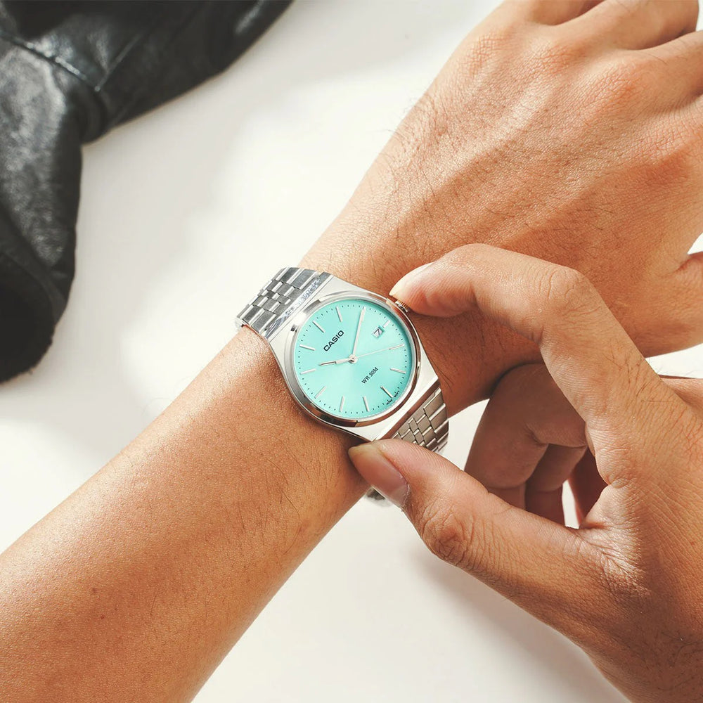 Casio Mtp-B145d-2a1vdf - Sporty Elegance With A Vibrant Blue Dial And Stainless Steel Bracelet by i-watch