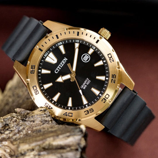 CITIZEN BI1043-01E BOLD EXPRESSION - Men's Gold & Black Urethane Watch for Every Adventure