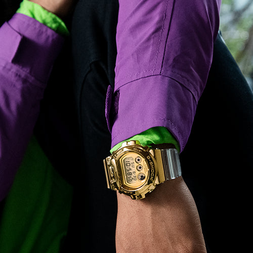 ساعة كاسيو جي شوك GM-6900SG-9DR - ساعة جولدن جلوري للرجال مع سوار راتنج أبيض أنيق ومتانة قوية