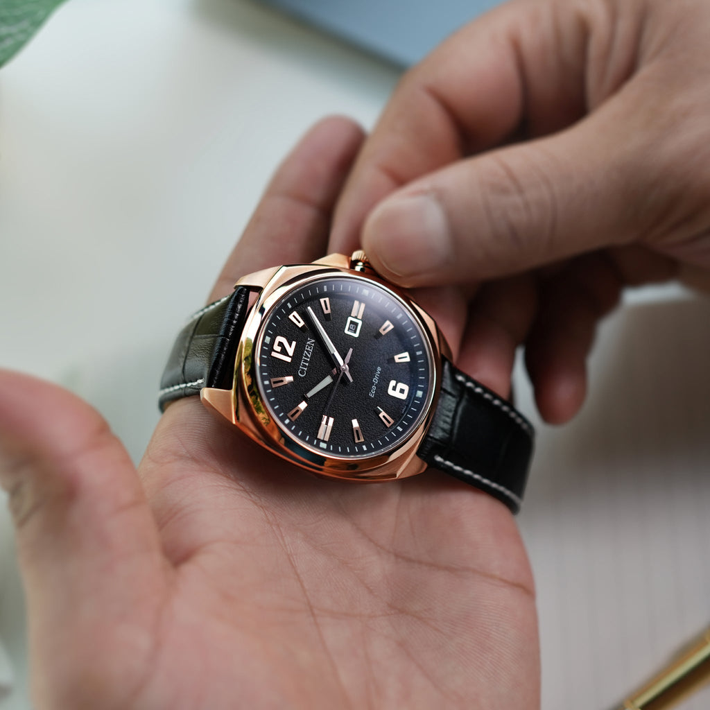 CITIZEN AW1723-02E mutige Eleganz – Uhr aus Roségold und schwarzem Leder für den modernen Mann