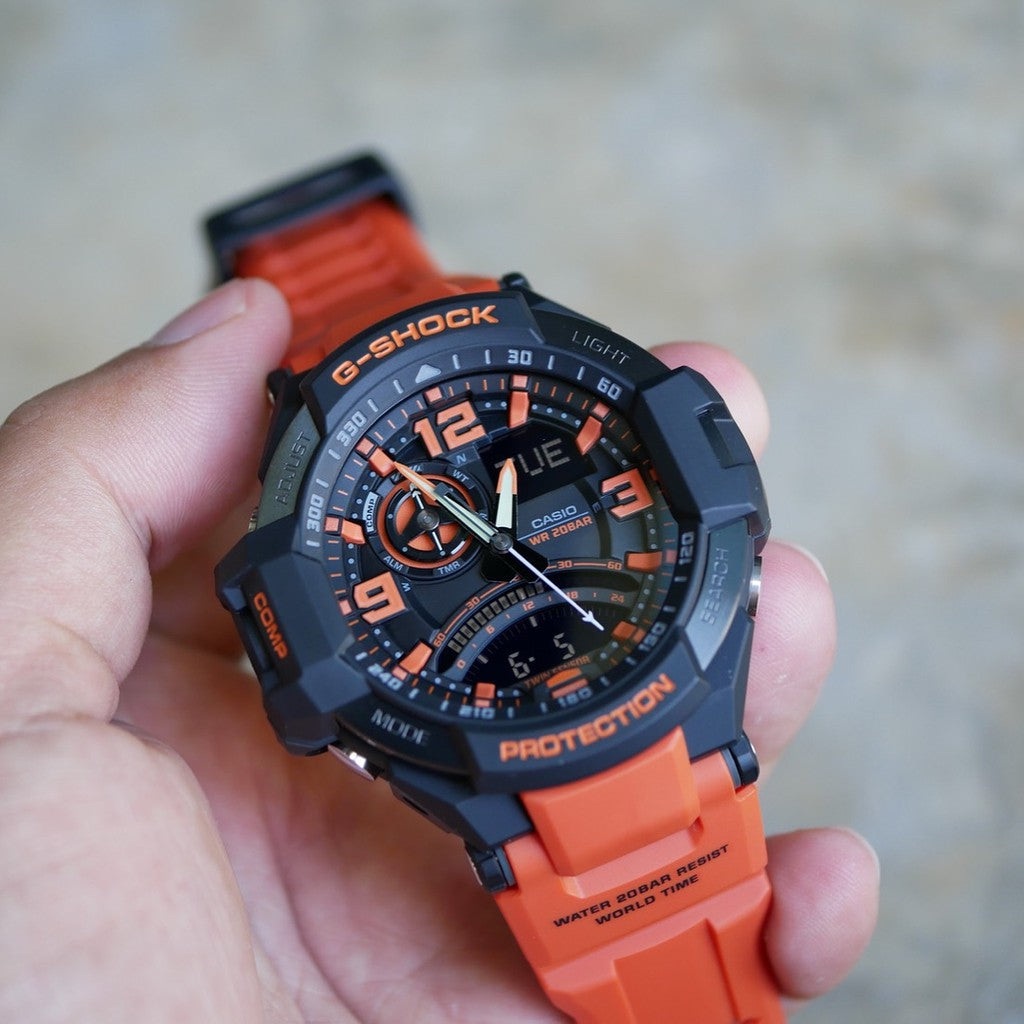 CASIO G-SHOCK GA-1000-4A ADVENTURE SEEKER - MEN'S RUGGED TIMEPIECE WITH ORANGE ACCENTS