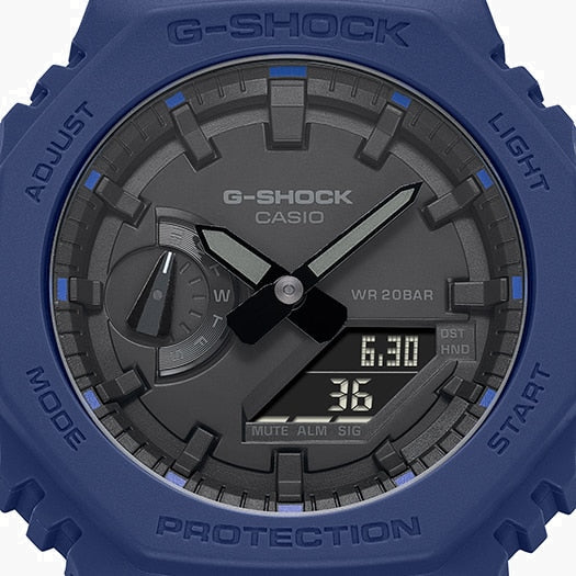 CASIO G-SHOCK GA-2100-2ADR OAK SPORTY INGENUITY – HERRENUHR MIT BLAUEM ZIFFERBLATT UND LILA GEHÄUSE