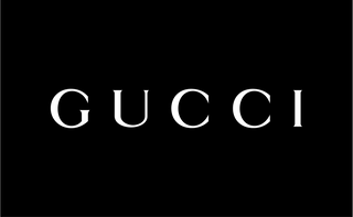 GUCCI logo on black background