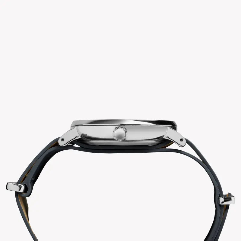 TIMEX Damenuhr mit silbernem Messinggehäuse und grauem Lederarmband