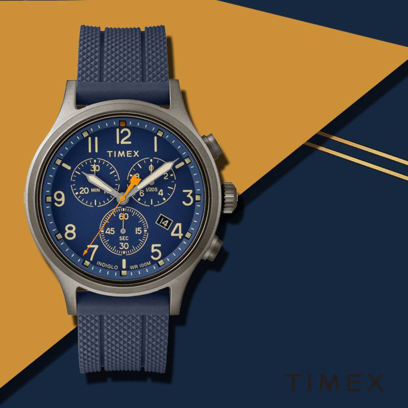 ساعة TIMEX Military Allied TW2R60300 - ساعة كرونوغراف للرجال من السيليكون والنحاس الأزرق مع إضاءة ليلية من INDIGLO