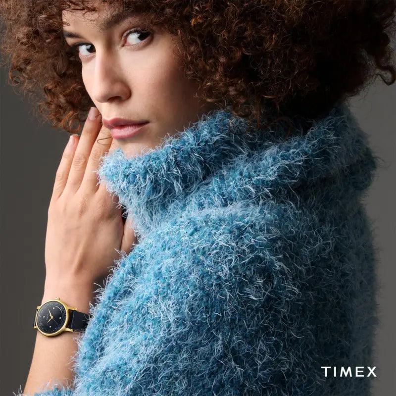 ساعة TIMEX النسائية بهيكل من النحاس الذهبي وسوار جلدي أزرق