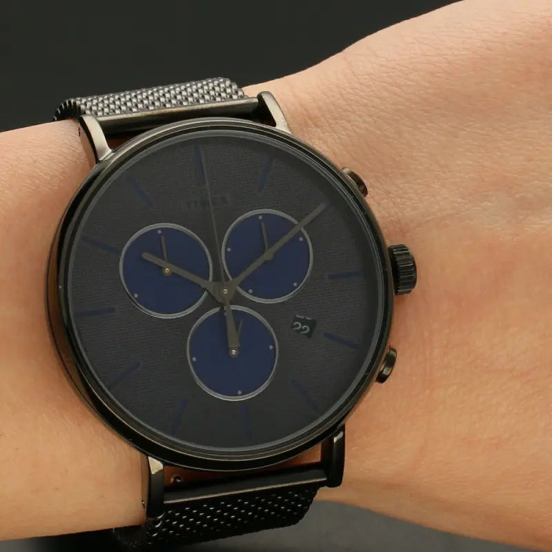 ساعة TIMEX Essential Fairfield TW2R98000 - ساعة رجالية باللون الرمادي من الفولاذ المقاوم للصدأ والنحاس مع إضاءة ليلية من INDIGLO