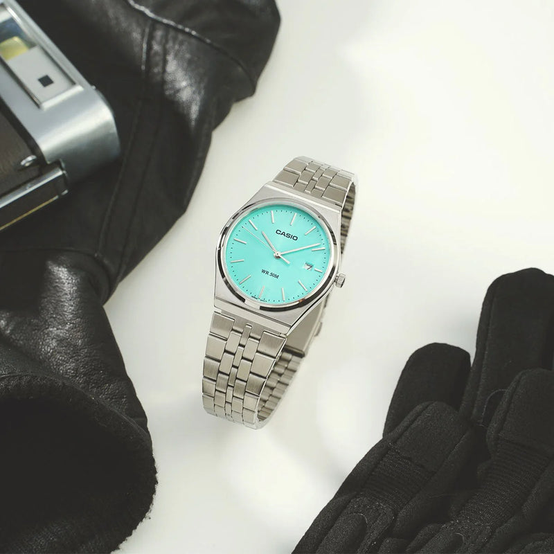Casio Mtp-B145d-2a1vdf - Sporty Elegance With A Vibrant Blue Dial And Stainless Steel Bracelet by i-watch