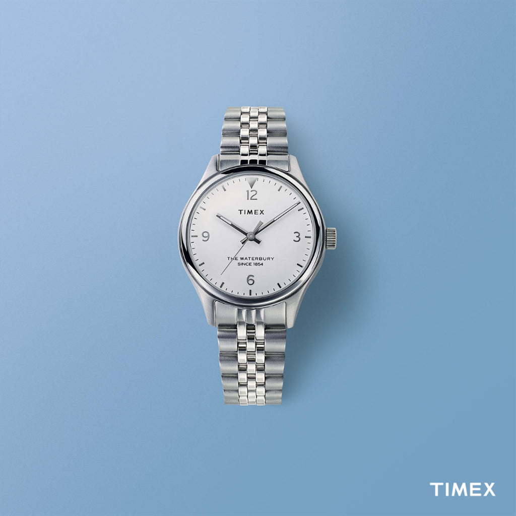 TIMEX Damenuhr mit silbernem Edelstahlgehäuse und silbernem Edelstahlarmband