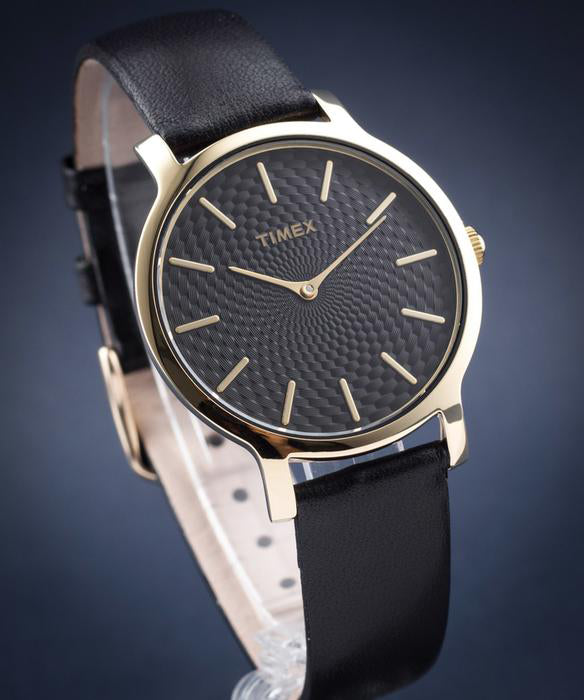 TIMEX Damenuhr mit goldenem Messinggehäuse und schwarzem Lederarmband