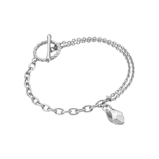 a silver bracelet with a heart charm on it