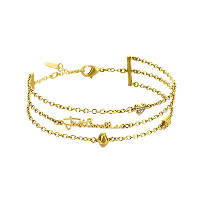 a gold bracelet with hearts on it