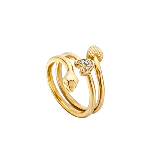 a gold ring with a heart and two diamonds