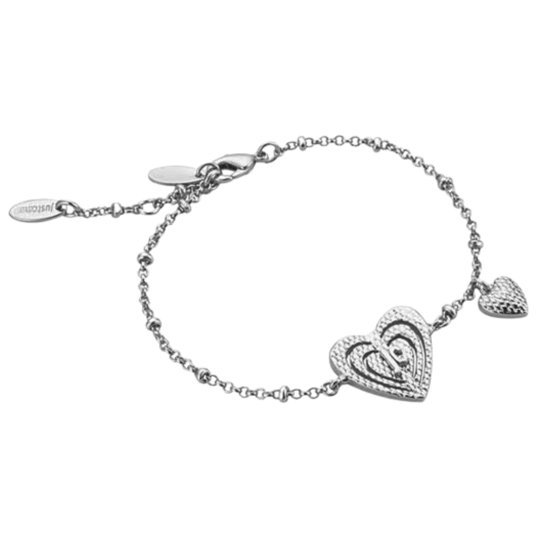 a bracelet with two hearts and two hearts on it