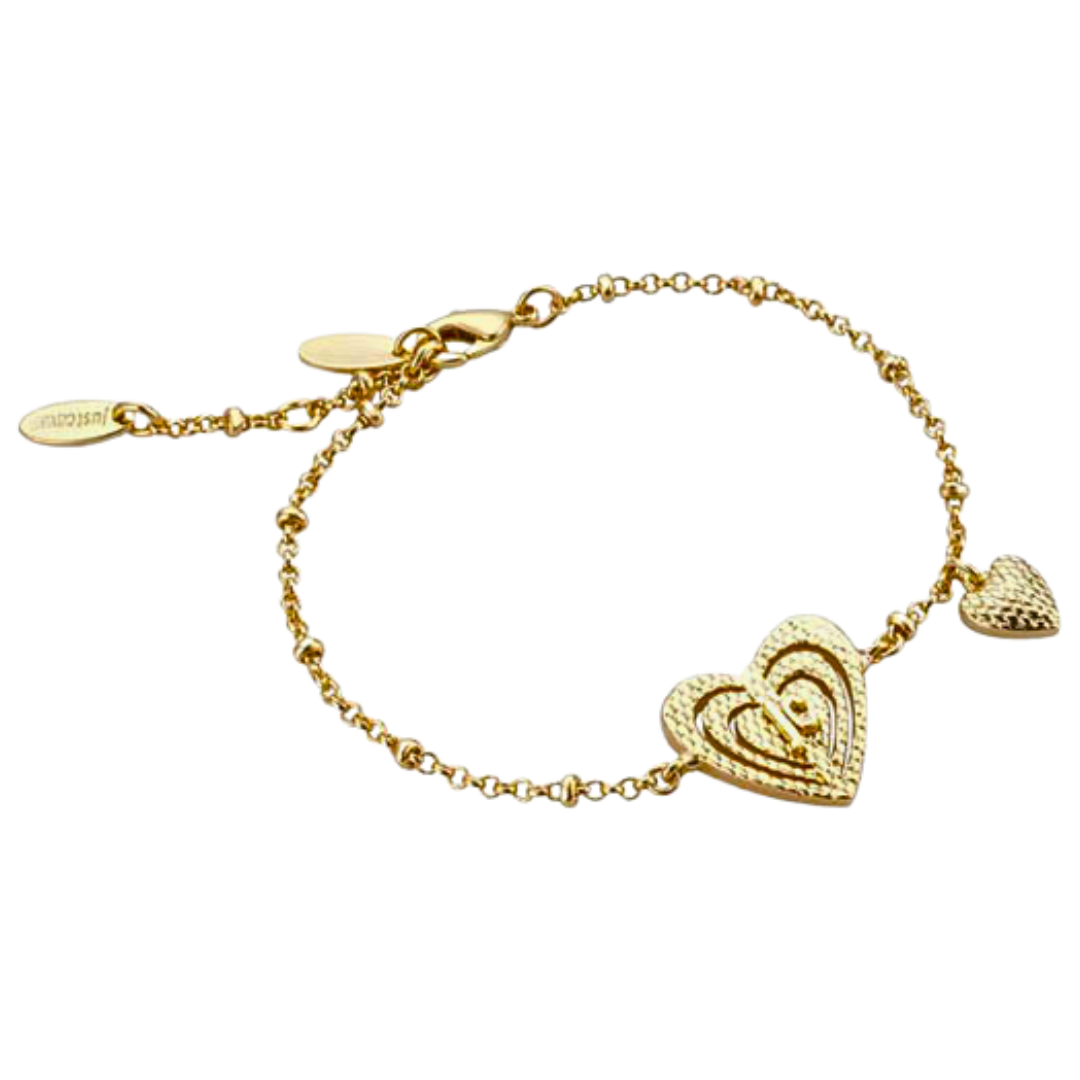 a gold bracelet with two hearts on it